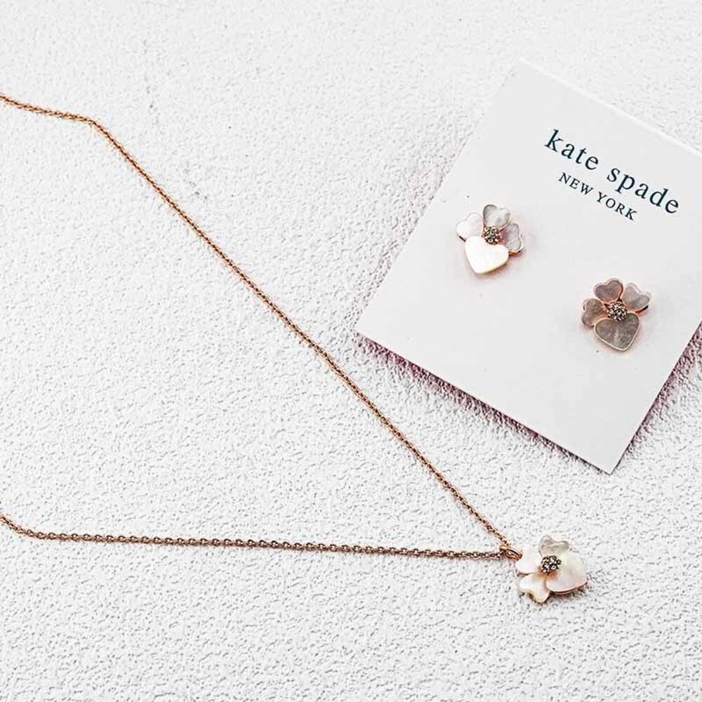 kate spade rose gold and white floral necklace and stud earring set